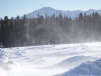 Pikes Peak from Rampart Range with blowing snow